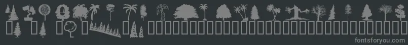 Wmtrees1-fontti – harmaat kirjasimet mustalla taustalla