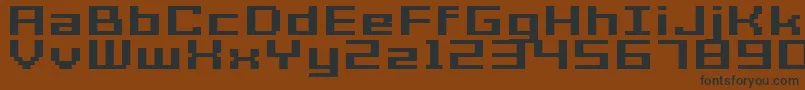GrixelAcme7WideBoldXtnd Font – Black Fonts on Brown Background