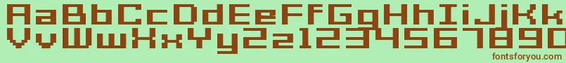 GrixelAcme7WideBoldXtnd-fontti – ruskeat fontit vihreällä taustalla