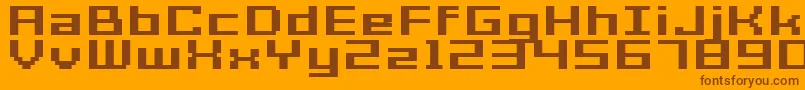GrixelAcme7WideBoldXtnd-fontti – ruskeat fontit oranssilla taustalla