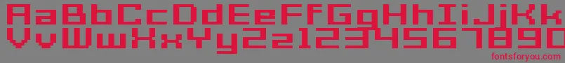 フォントGrixelAcme7WideBoldXtnd – 赤い文字の灰色の背景