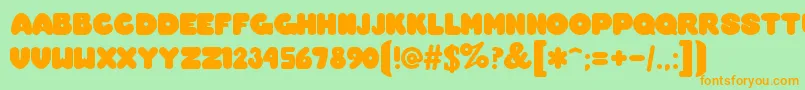 Overmch Font – Orange Fonts on Green Background