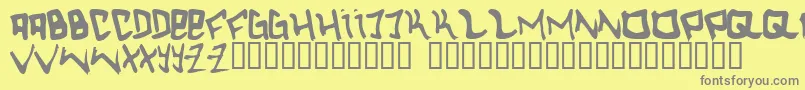 フォントHc – 黄色の背景に灰色の文字