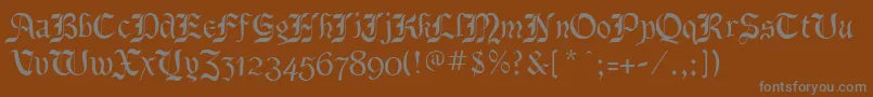 BenecryptineRegular-fontti – harmaat kirjasimet ruskealla taustalla