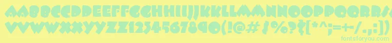 BeeskneesItcTt Font – Green Fonts on Yellow Background