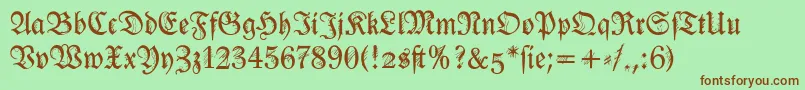 Fonte Ironfraktur – fontes marrons em um fundo verde