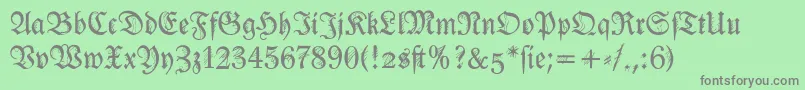 Ironfraktur-Schriftart – Graue Schriften auf grünem Hintergrund