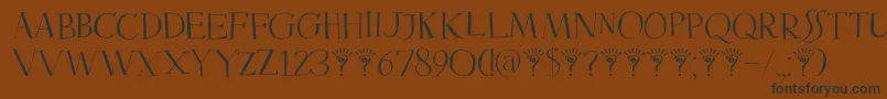 DkMysterious Font – Black Fonts on Brown Background
