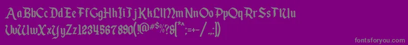 フォントEnchantedLand – 紫の背景に灰色の文字