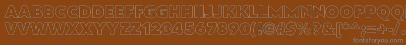 Fonte Flatbreadoutline – fontes cinzas em um fundo marrom