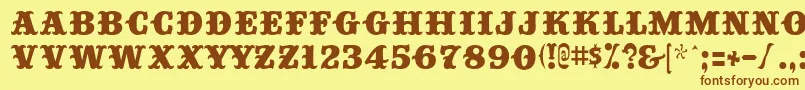 フォントBigtop ffy – 茶色の文字が黄色の背景にあります。