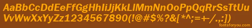 FranklingothdemigttItalic-fontti – oranssit fontit ruskealla taustalla