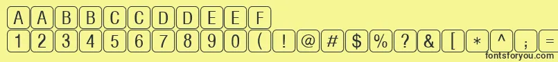 RrkeylettersNormal Font – Black Fonts on Yellow Background