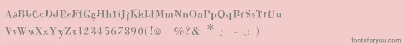 フォントDekale – ピンクの背景に灰色の文字