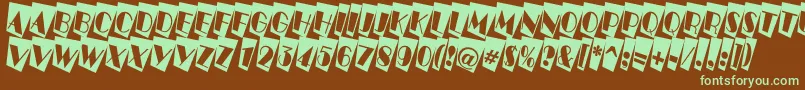 ABenttitulcmtwnr-fontti – vihreät fontit ruskealla taustalla