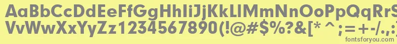Geometric706BlackBt-fontti – harmaat kirjasimet keltaisella taustalla