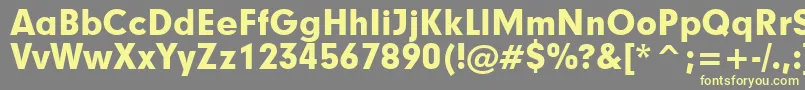 フォントGeometric706BlackBt – 黄色のフォント、灰色の背景