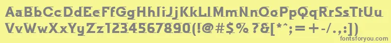 フォントOdysseeItcTtBold – 黄色の背景に灰色の文字