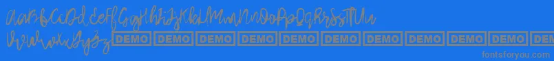 ArthardDemo-fontti – harmaat kirjasimet sinisellä taustalla