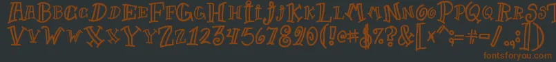 Goofball1-fontti – ruskeat fontit mustalla taustalla