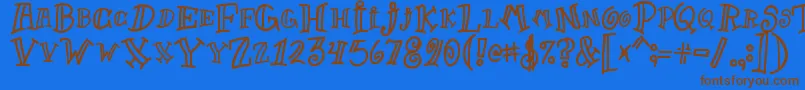 Goofball1-Schriftart – Braune Schriften auf blauem Hintergrund