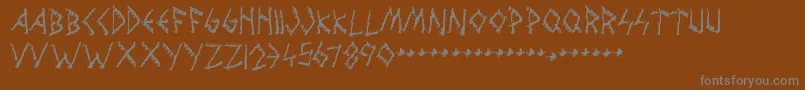 WolvesEngravenフォントについての詳細 フォントWolvesEngraven – 茶色の背景に灰色の文字