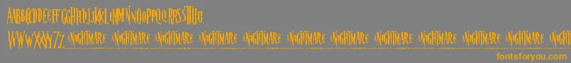 フォントNightmare5 – オレンジの文字は灰色の背景にあります。