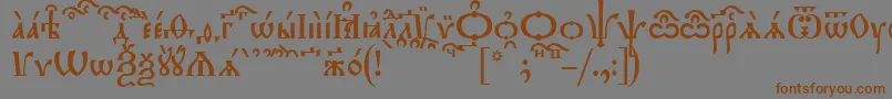 TriodionKucs Font – Brown Fonts on Gray Background