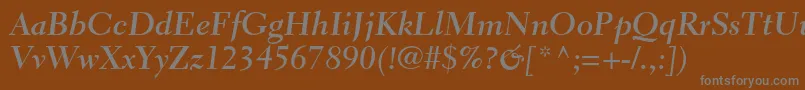 ElectraltstdBoldcursive-fontti – harmaat kirjasimet ruskealla taustalla