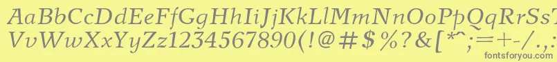 NewjournalItalic Font – Gray Fonts on Yellow Background