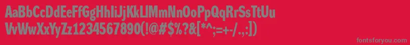 DynagroteskdcBold-fontti – harmaat kirjasimet punaisella taustalla