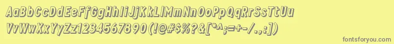 WyvernblockoRegular-fontti – harmaat kirjasimet keltaisella taustalla