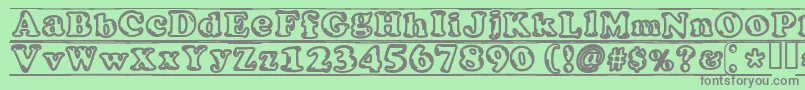 フォントIjifufontBlade – 緑の背景に灰色の文字