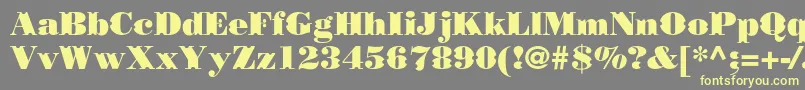 Borjomidecorcc-Schriftart – Gelbe Schriften auf grauem Hintergrund