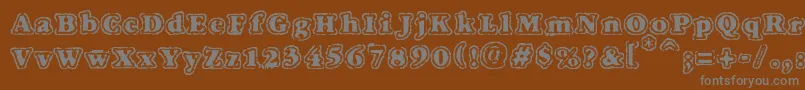 Шрифт VtcFuzzypunkyslippersRegular – серые шрифты на коричневом фоне