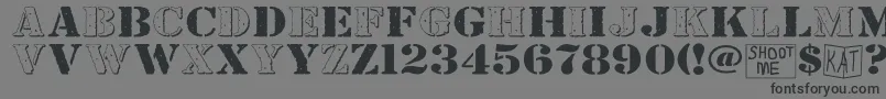 Bndyylwhs-Schriftart – Schwarze Schriften auf grauem Hintergrund