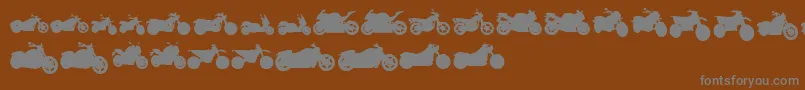 MotosTfb Font – Gray Fonts on Brown Background