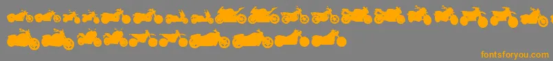 MotosTfb-Schriftart – Orangefarbene Schriften auf grauem Hintergrund