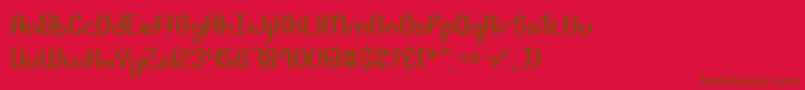 Roughday-Schriftart – Braune Schriften auf rotem Hintergrund