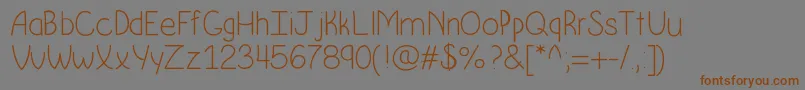 Krumkake Font – Brown Fonts on Gray Background