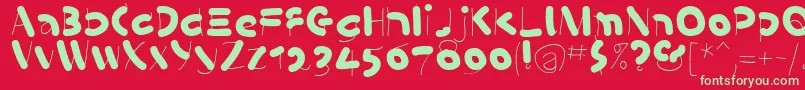KleinsSausages-Schriftart – Grüne Schriften auf rotem Hintergrund