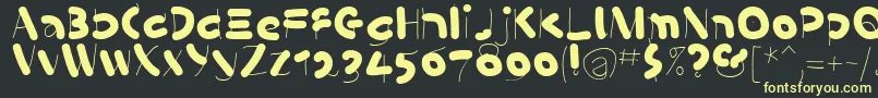 KleinsSausages-Schriftart – Gelbe Schriften auf schwarzem Hintergrund