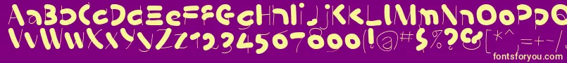Fonte KleinsSausages – fontes amarelas em um fundo roxo
