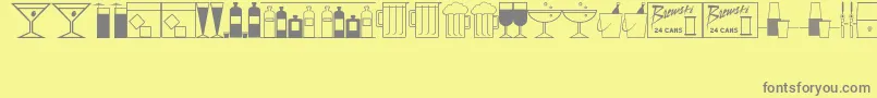 フォントBottomsUpJl – 黄色の背景に灰色の文字