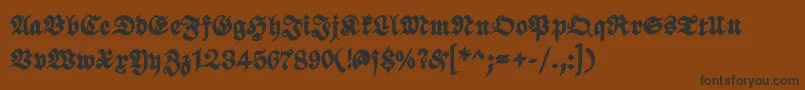 ScribbledfrakturXheavy Font – Black Fonts on Brown Background