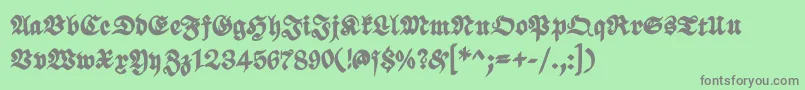 フォントScribbledfrakturXheavy – 緑の背景に灰色の文字