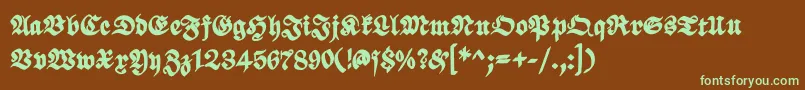 フォントScribbledfrakturXheavy – 緑色の文字が茶色の背景にあります。