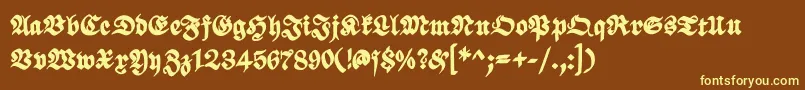 ScribbledfrakturXheavy-fontti – keltaiset fontit ruskealla taustalla