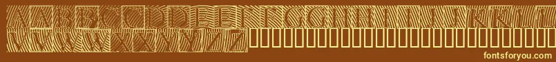 Lowengravedcapshollow-fontti – keltaiset fontit ruskealla taustalla