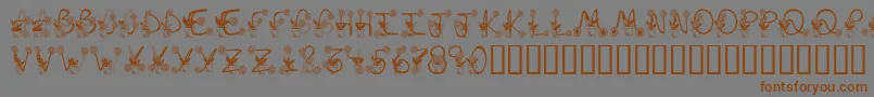 Шрифт Sunflowers – коричневые шрифты на сером фоне